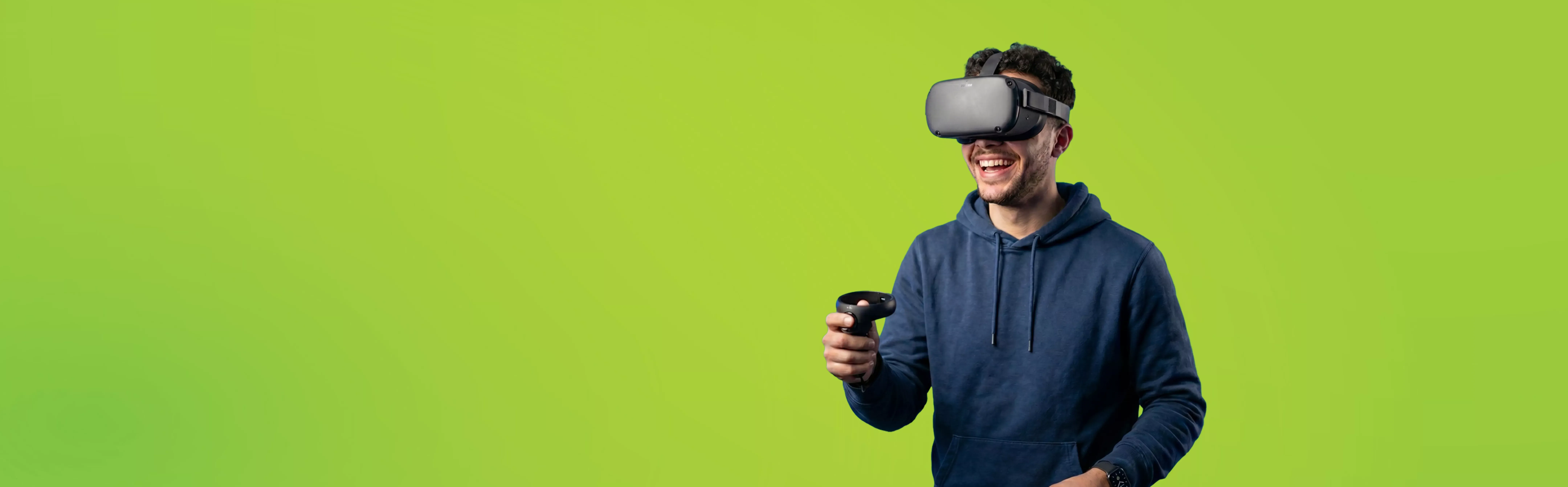 Man uses VR on lime green background